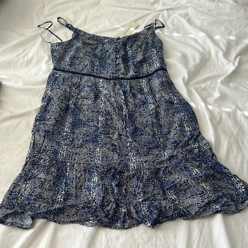 Francesca’s brand new blue dress